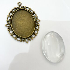 Oval Ornament Metallic Frame Pendant